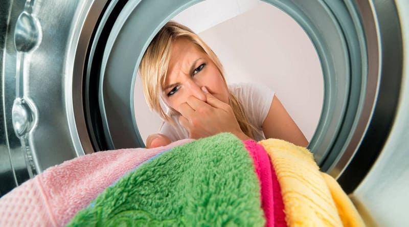 Почему запах в стиральной машинке и как от него избавиться? - фото 1